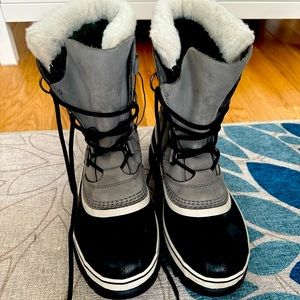 Sorel caribou size 8.5 worn a total of 2 x . Very warm keeps the water out
